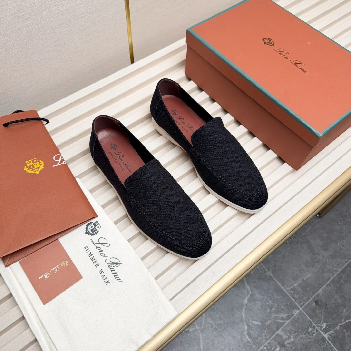 Men's Men's Shoes 💰400 Loro PIana moccasins are made of wish wool fabric. The upper is made of knitted fabric, made on a loom, and then attached to a rubber sole. The Rain System's water-repellent treatment enhances the shoe's functional design, while the suede details give the shoe a sense of elegance and sophistication. Made from Wish, fine wool from Australian and New Zealand Merino sheep